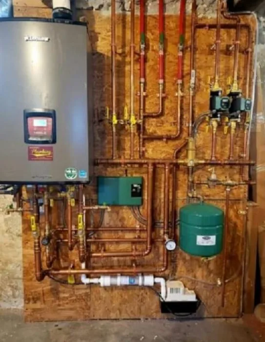 Tankless water heater system installation